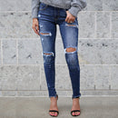 Women's Tight Fit Rip Leg Jeans.