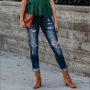 Women's Tight Fit Rip Leg Jeans.