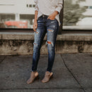Women's Tight Fit Rip Leg Jeans.