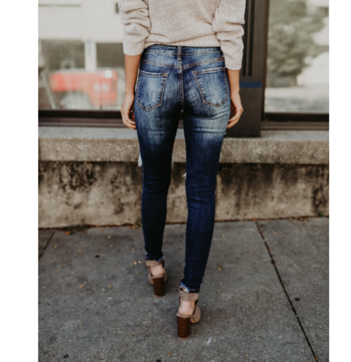 Women's Fringed Ankle Mid-Rise jeans.