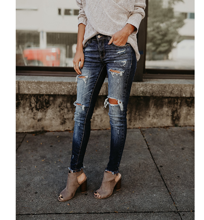 Women's Fringed Ankle Mid-Rise jeans.