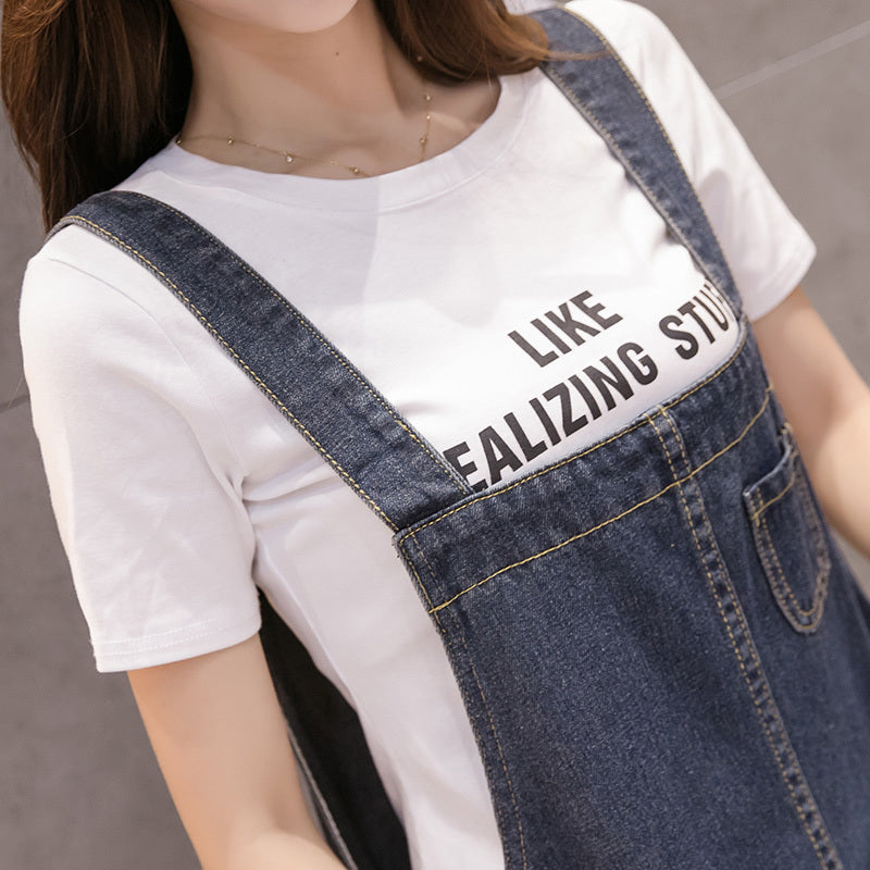 Denim suspenders skirt.