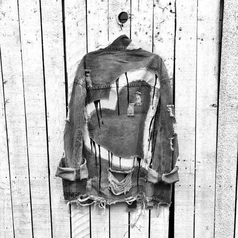 Ripped denim jacket