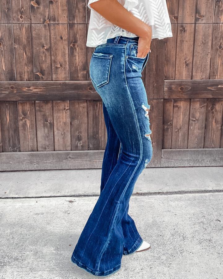 Casual Women's High-Rise Ripped Washed Jeans.