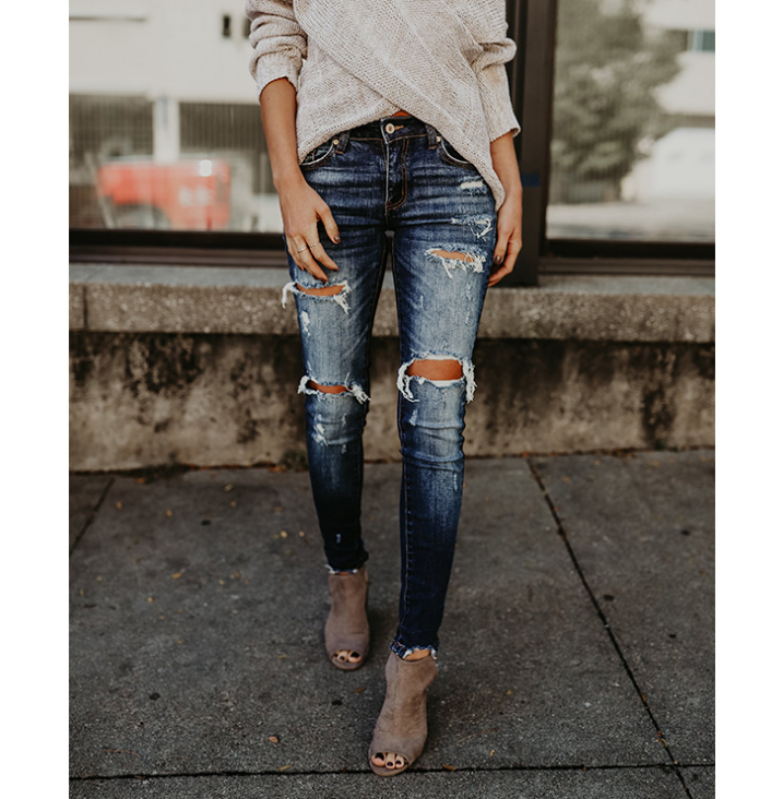 Women's Fringed Ankle Mid-Rise jeans.